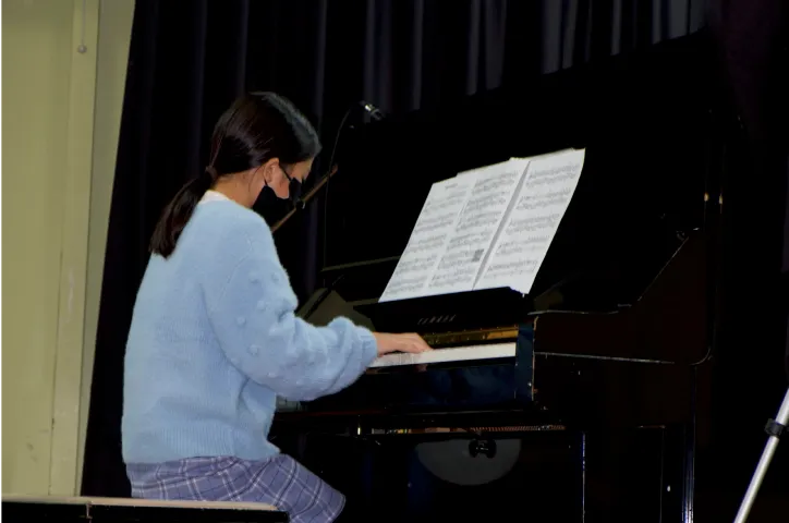 Student learning piano at Horizon Music Academy