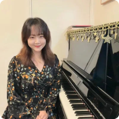 Ms Mandy, piano instructor